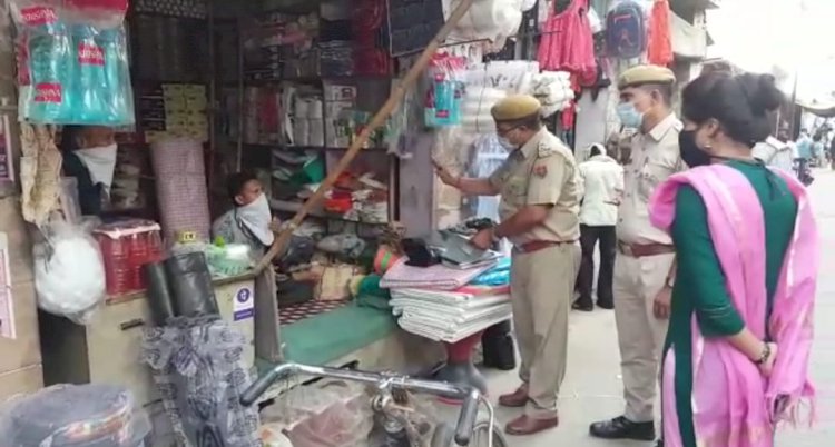 बिना मास्क पहने दुकानदारो पर तहसीलदार और पुलिस प्रशासन ने कार्यवाही करते हुए  लगाया जुर्माना